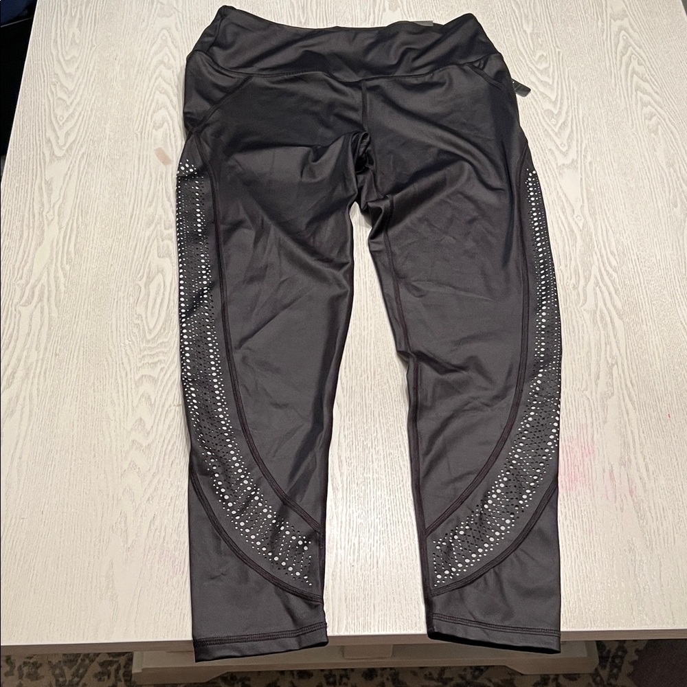 Victoria Sport Knockout Tight with mesh cutout details on the sides
